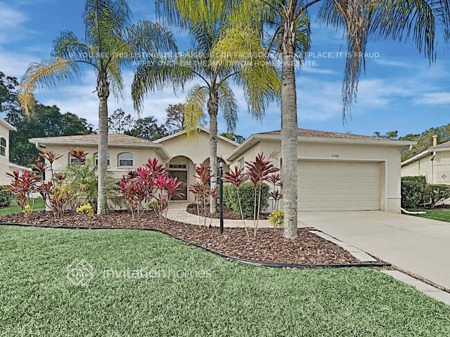 Building Photo - 11706 Winding Woods Way