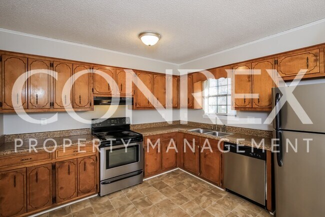 Building Photo - Minutes Away from Fort Gordon!