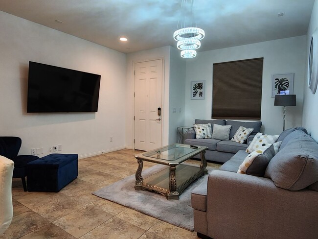 Building Photo - PARTIALLY FURNISHED SINGLE STORY TOWNHOME
