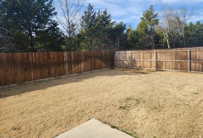 Building Photo - Backs to Wooded Area • Split Bedrooms • Modern & All-Electric