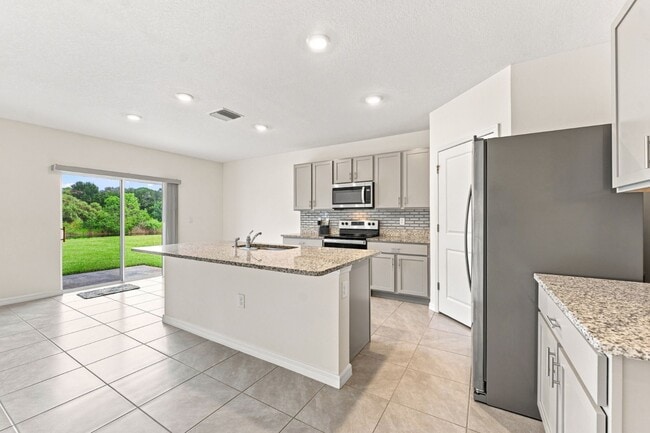 Building Photo - Absolutely Stunning! 4-bedroom, 3-bath, 2-car garage home ideally situated on a quiet cul-de-sac