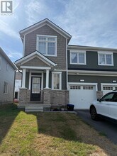 Building Photo - 712 Quilter Row