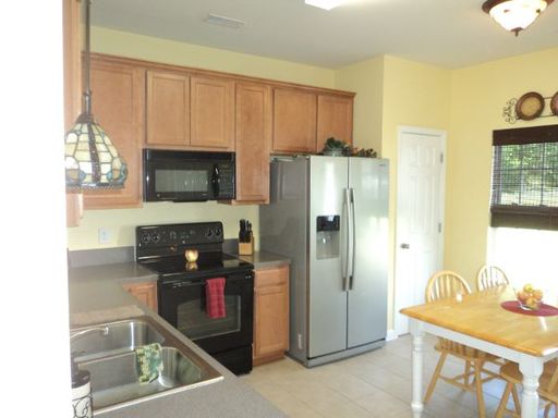 Building Photo - 8430 Meadowcreek Village Dr