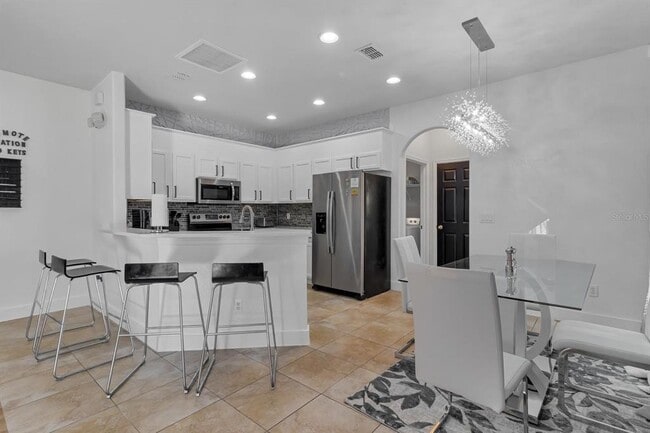 Building Photo - 16748 Lazy Breeze Loop
