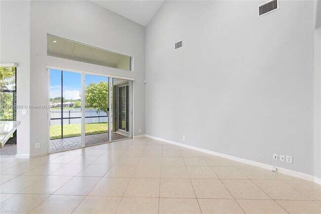 Foto del edificio - 4 br, 3 bath House - 7791 NW 125th Ln