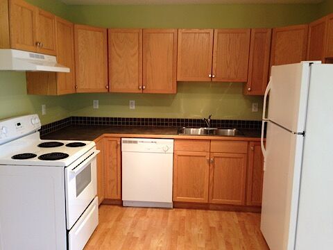 Building Photo - Fourplex in Olds