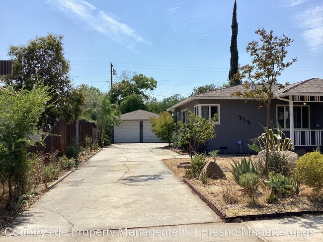 Building Photo - 3 br, 2 bath House - 313 W. Robinson Avenue