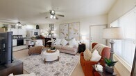 Located at 11 Augusta Ct in Little Rock, Arkansas, this single-story, 2-bedroom, 2-bathroom residence offers a well-designed layout with a comfortable and cohesive flow throughout. The open-concept living and dining area serves as the heart of the home, featuring neutral tones, carpet flooring, ceiling fans with integrated lighting, and ample natural light from windows with blinds. The space is inviting and versatile, comfortably accommodating both relaxed living and dining.

The kitchen is fully equipped with white cabinetry, dark granite-style countertops, black appliances including a range, microwave, dishwasher, and refrigerator, as well as hardwood-style flooring. A dedicated in-unit laundry closet with washer and dryer hookups is conveniently located adjacent to the kitchen.

The primary bedroom is a generously sized retreat with a ceiling fan, carpet flooring, a large closet, and access to a private en-suite bathroom. The en-suite features a single vanity, a tub-shower combo with sliding glass doors, and hardwood-style flooring. The second bedroom is well-proportioned with its own ceiling fan, natural light, and closet access. The second full bathroom mirrors the en-suite in style and function. A hallway connects all areas efficiently, completing this practical and well-appointed single-floor layout.