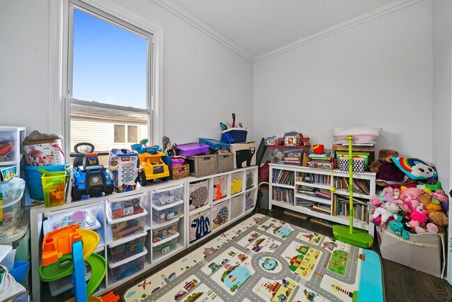 Bedroom #4 located on the 1st level. - 1910 W School St