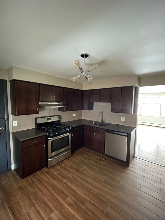 Building Photo - 6646 N Harlem Ave