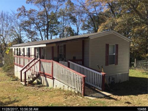 Primary Photo - Cozy 1,120 sqft home is a 3 BR, 2 BA MH