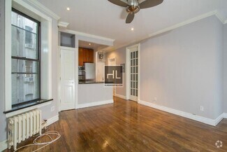 Building Photo - Bright Nolita 3-Bedroom with Skyline Views