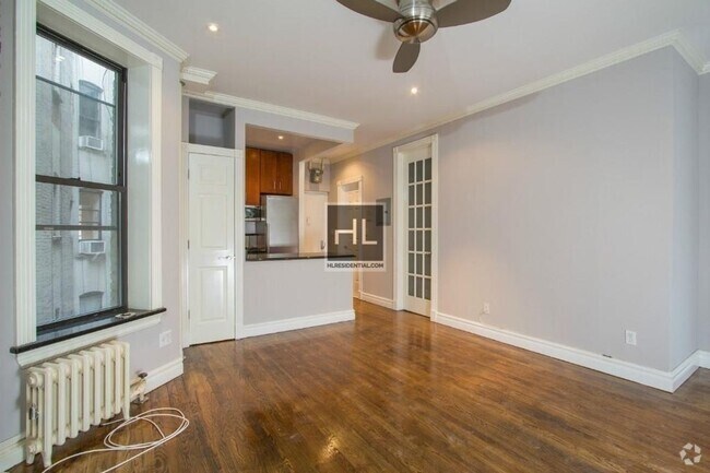 Building Photo - Bright Nolita 3-Bedroom with Skyline Views
