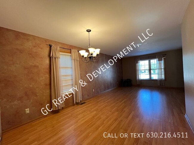 Building Photo - *** AURORA 4 BDRM - 2.5 BTH / FIN BSMT /EA...