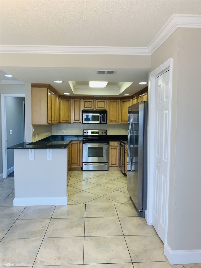 Foto del edificio - 9518 Citrus Glen Pl
