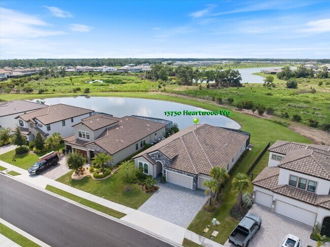 Foto del edificio - Luxury Home w/ Pool, Outdoor Kitchen, Car Lift, & Water View In Parrish!