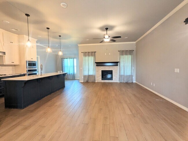 Building Photo - Beautiful Edmond Home | Gas Fireplace, Storm Shelter & Fenced Backyard!