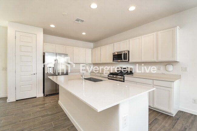 Foto del edificio - 10127 E Ulysses Ave