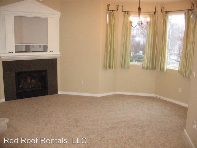 Building Photo - 2 br, 2.5 bath House - 210 N "G" St Apt A