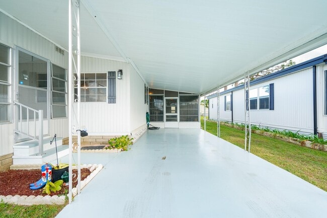 Carport and Main Entry - 1401 W Highway 50