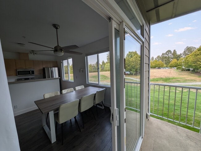 Enter into living room from balcony - 710 240th Way SE