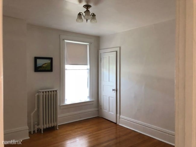 Building Photo - 209-211 E 3rd St