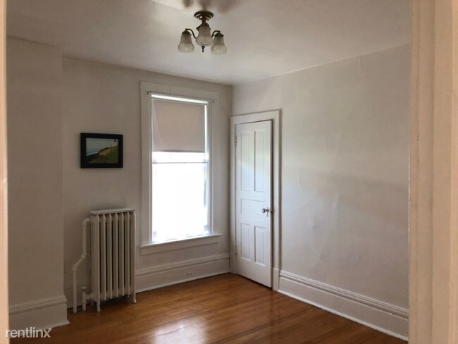 Foto del edificio - 209-211 E 3rd St