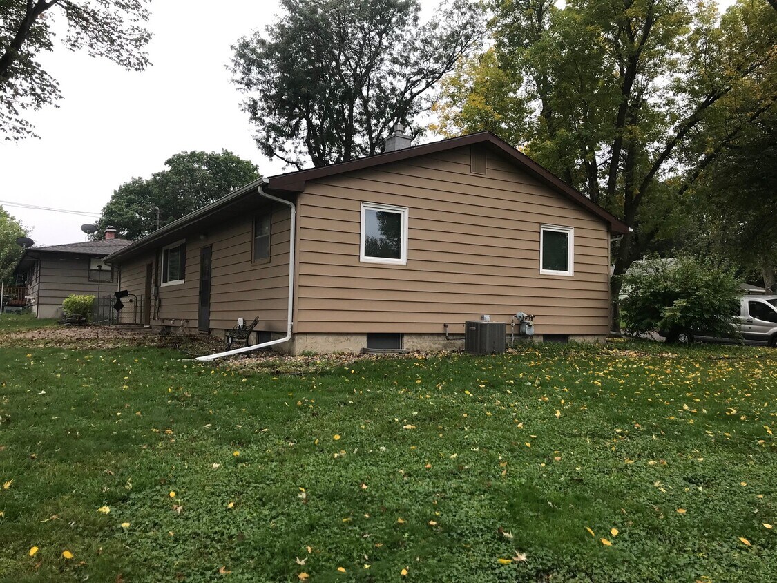 Side of home and backyard - 1300 S Riverdale Rd