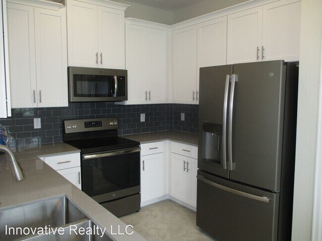 Building Photo - 4 br, 3.5 bath House - 11504 Whistling Pin...