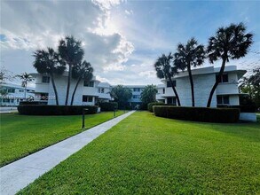 Building Photo - 10190 Collins Ave