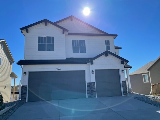 Building Photo - 6866 Petunia Pl