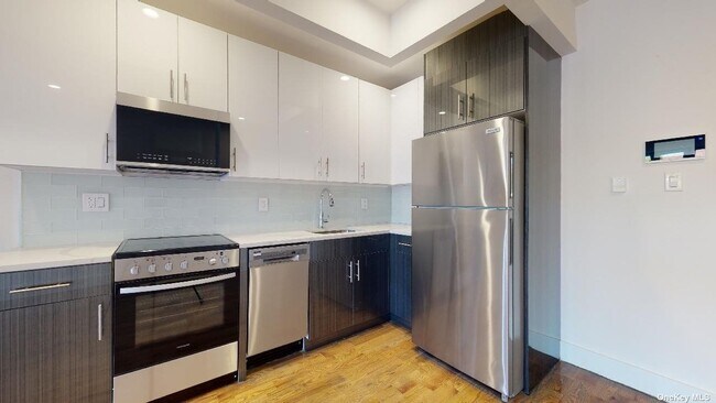 Building Photo - 13828 Queens Blvd