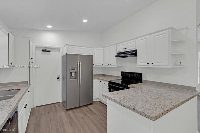 Building Photo - 3 br, 2 bath House - 6620 SW 6th St