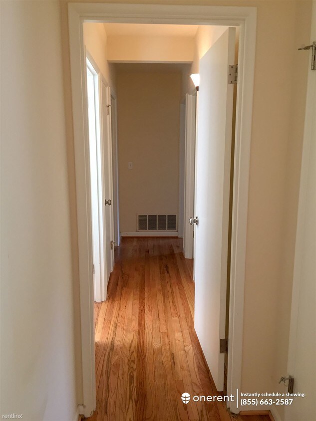 Foto principal - 4 br, 2.5 bath House - 8445 NE 9th St