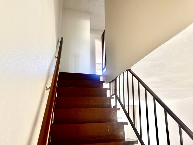 upstairs to bedrooms - 619 W Provential Dr