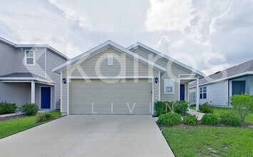 Building Photo - 8590 SW 44th Ct