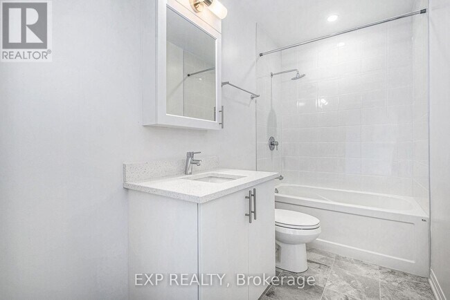 Photo du bâtiment - 805-1805 Carling Ave
