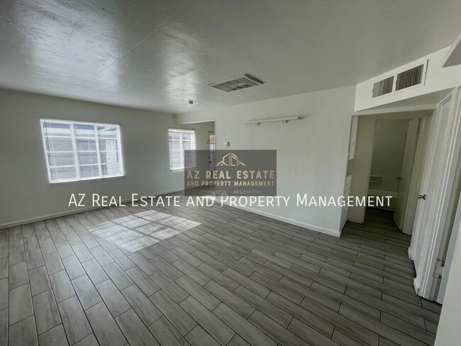 Building Photo - 7210 N 55th Dr