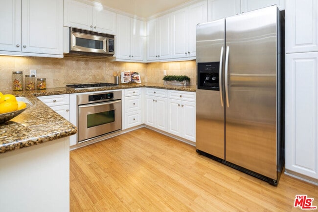 Building Photo - 12975 Agustin Pl