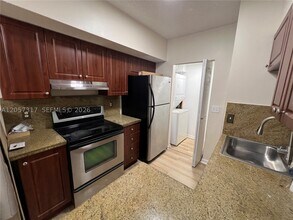 Building Photo - 202 Sable Palm Way
