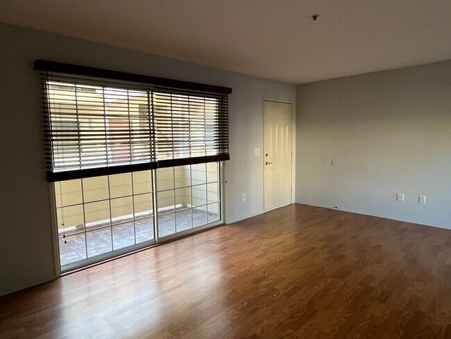 Living room: Sliding door to balcony/patio - 430 W Alameda Ave