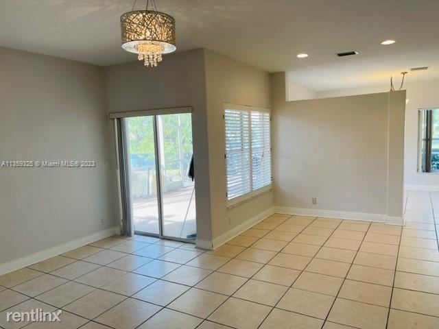 Building Photo - 3 br, 2.5 bath House - 8009 Pelican Harbou...