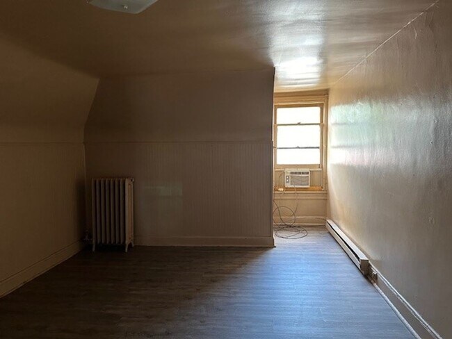 Building Photo - Introducing a cozy studio apartment in the...