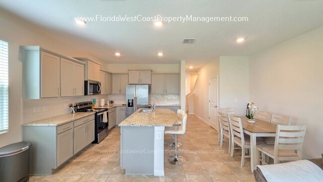 Building Photo - OUTSTANDING CORNER TOWNHOME  3 Bedroom/2.5 BATH PLUS FLEX- BONUS! SUPER LOCATION TO WATERSIDE- SA...