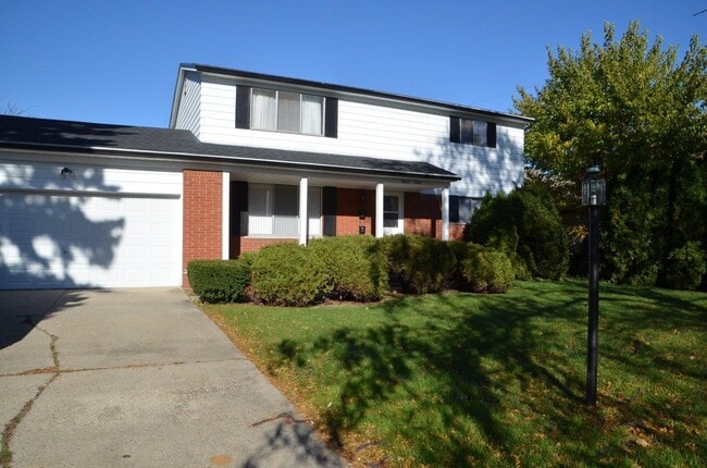 Front yard and garage - 5445 Chicago Rd