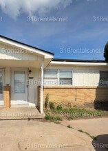 Building Photo - 4400-4402 S Dodge Ave