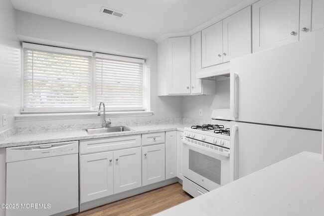 Foto del edificio - 30 Winged Foot Ln