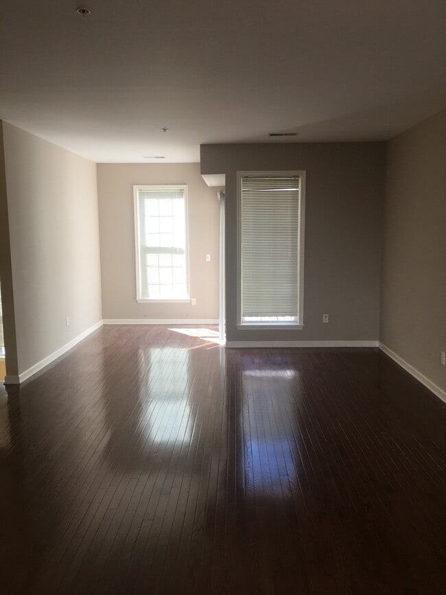 Living Room showing windows and work alcove - 201 Dey St Apartment