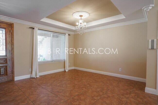 Building Photo - Charming 4-Bed with 3 Baths & Cozy Firepla...