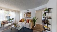 Located at 132 Fountain Oaks Circle in Sacramento, CA, this 2-bedroom, 1-bathroom home offers a practical and comfortable single-floor layout. The living room serves as the heart of the space, featuring wood-style flooring, a textured ceiling, and large windows with sheer curtains that allow generous natural light to fill the room. A sliding glass door adds to the bright, open feel and provides outdoor access.

The kitchen is equipped with light wood cabinetry, a full suite of white appliances including a refrigerator, dishwasher, and electric range, along with ample counter space and storage. Wood-style flooring continues throughout, providing a cohesive look.

Both bedrooms are well-sized, with the primary bedroom offering a notably spacious footprint. Each room features large windows with views of surrounding greenery, wood-style flooring, and textured ceilings. The rooms provide a calm, restful atmosphere with plenty of wall space.

The full bathroom includes a shower-tub combination and clean white fixtures. A connecting hallway ties the layout together efficiently. Throughout the home, neutral wall tones and consistent flooring create a unified, move-in-ready aesthetic ideal for everyday living in the Sacramento area.